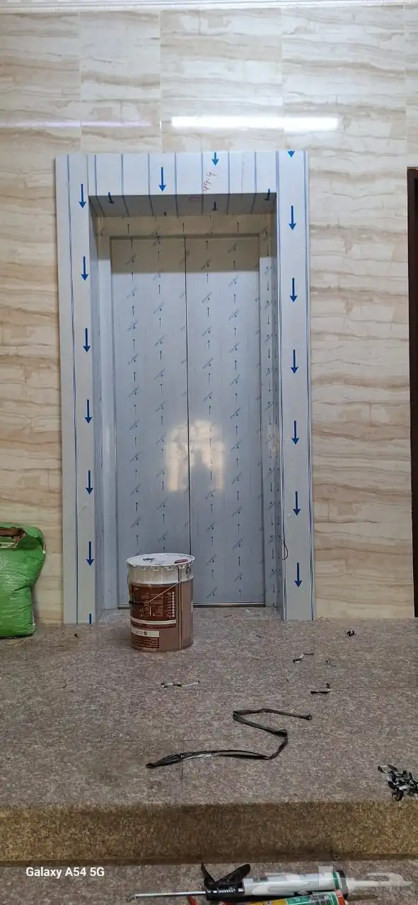 تقفيل تكسيات تلبيس ديكورات وبراويز استيل حول ابواب المصاعد 1