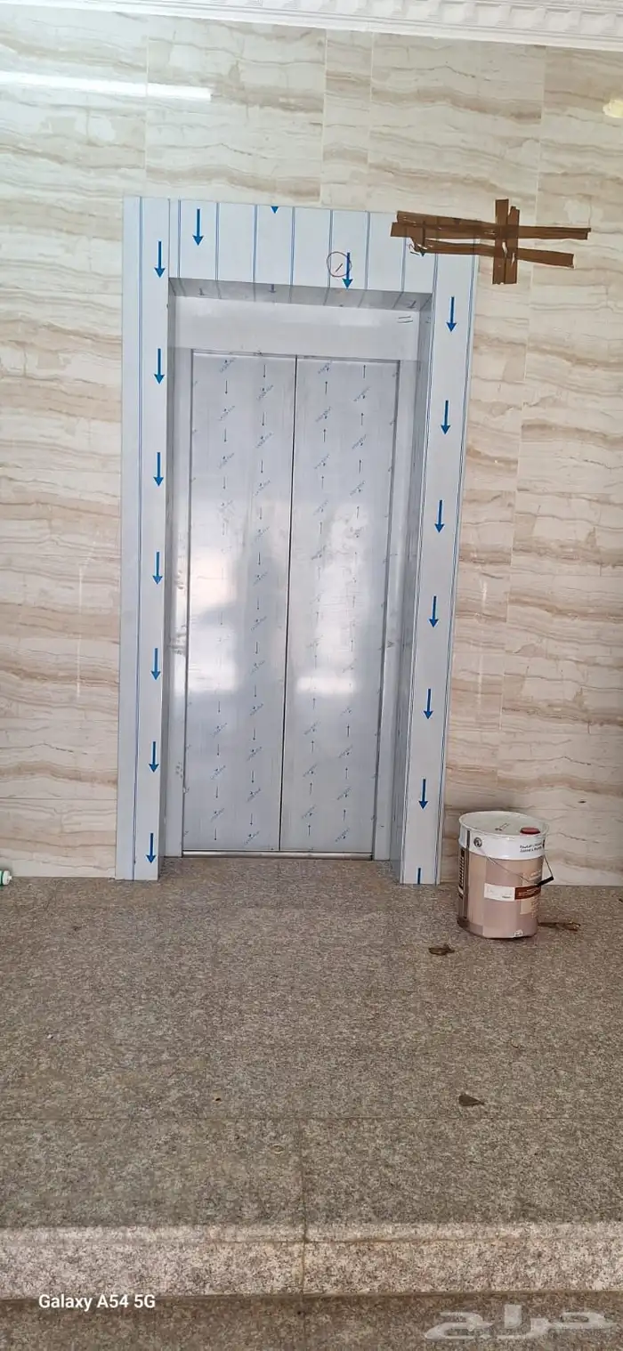 تقفيل تكسيات تلبيس ديكورات وبراويز استيل حول ابواب المصاعد 0