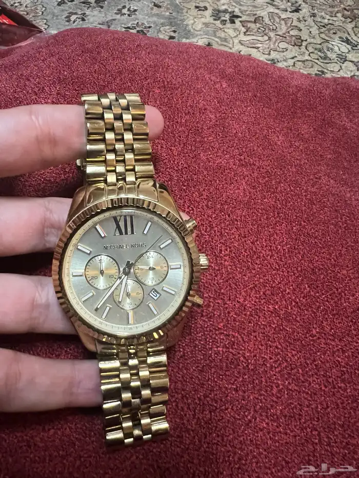 ساعه مايكل كورس ذهبي رجالي mikel courus watch oroginal 0