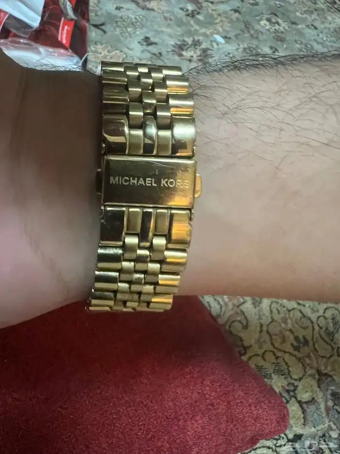 ساعه مايكل كورس ذهبي رجالي mikel courus watch oroginal 1