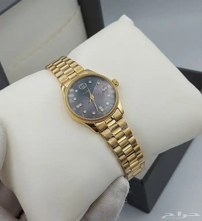 ساعات قوتشي نسائية 12