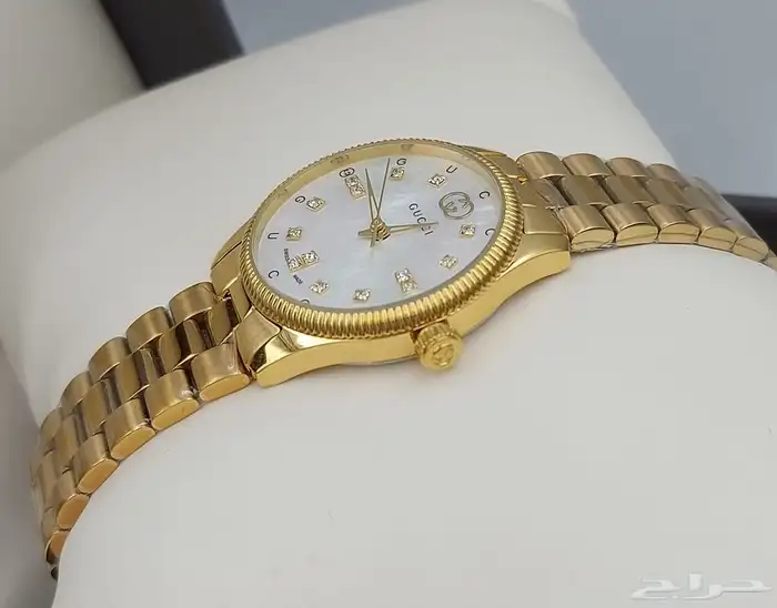 ساعات قوتشي نسائية 9