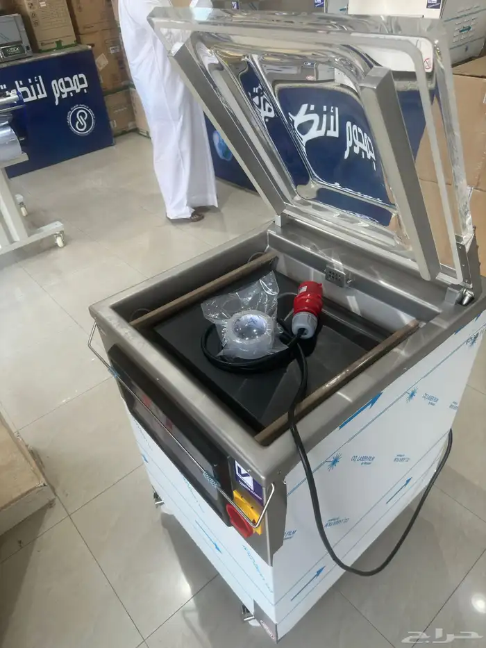 عرض الة تغليف الهديه وحلويات وعصيرات وجميع انواع 5