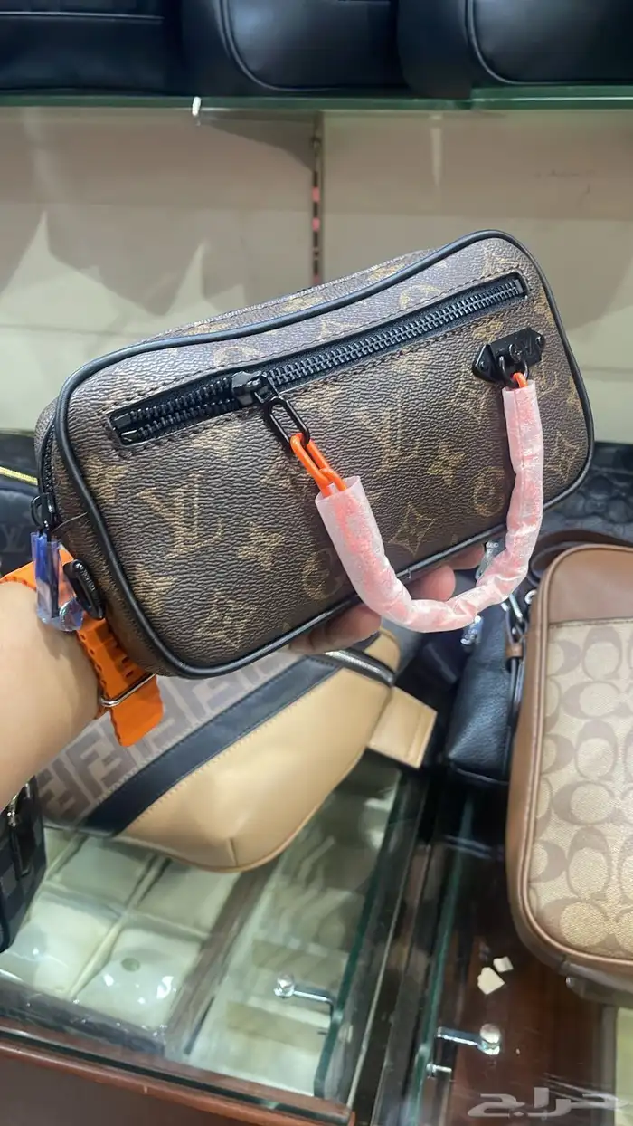 شنط يد رجاليه 9