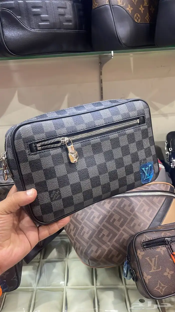 شنط يد رجاليه 8