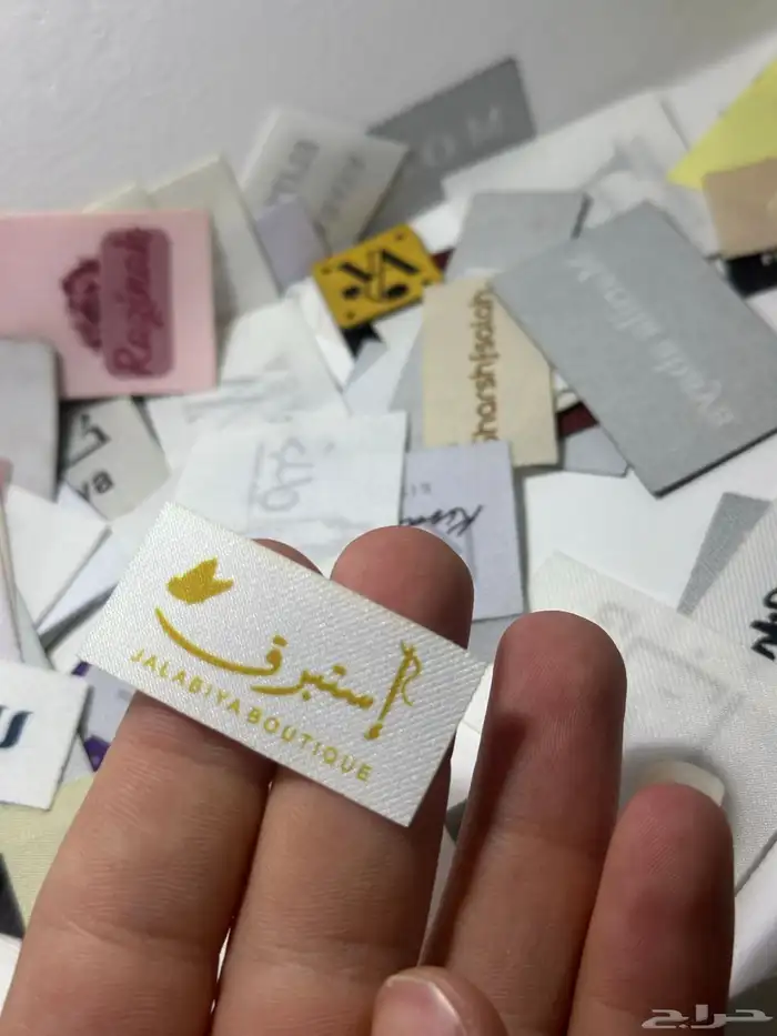 طباعة ليبل عبايات قماش وجلد كميات قليلة بكجات عباية 8