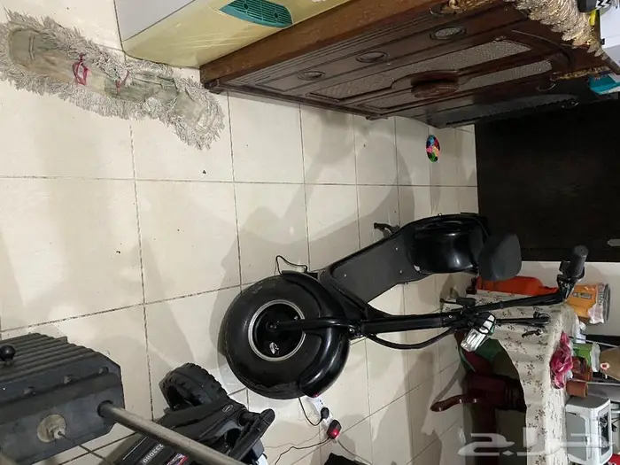 دراجة هارلي و طابعة اتش بي وايرلس تانك 415 رقمها 16