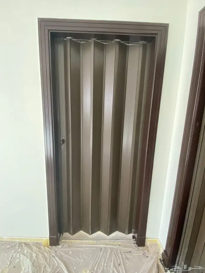 أبواب أكورديون سحاب بيلاستيك وجلد 6