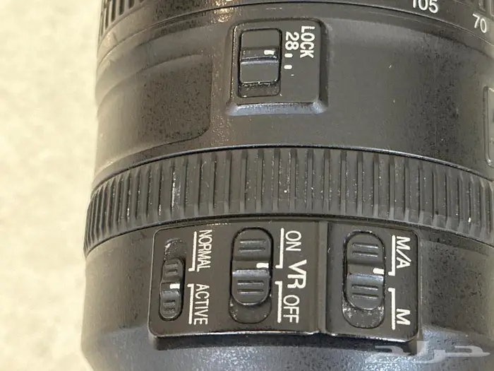 عدسة نيكون زوم 28-300مم 4