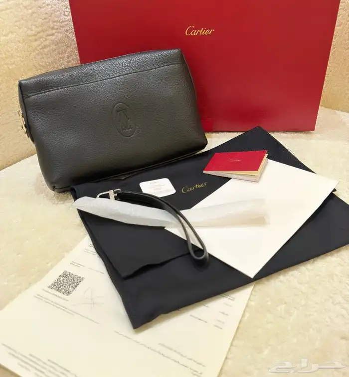 شنطة يد كارتير اصليه 0