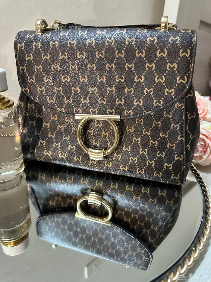 شنط ماركة وساعات رجاليه 2