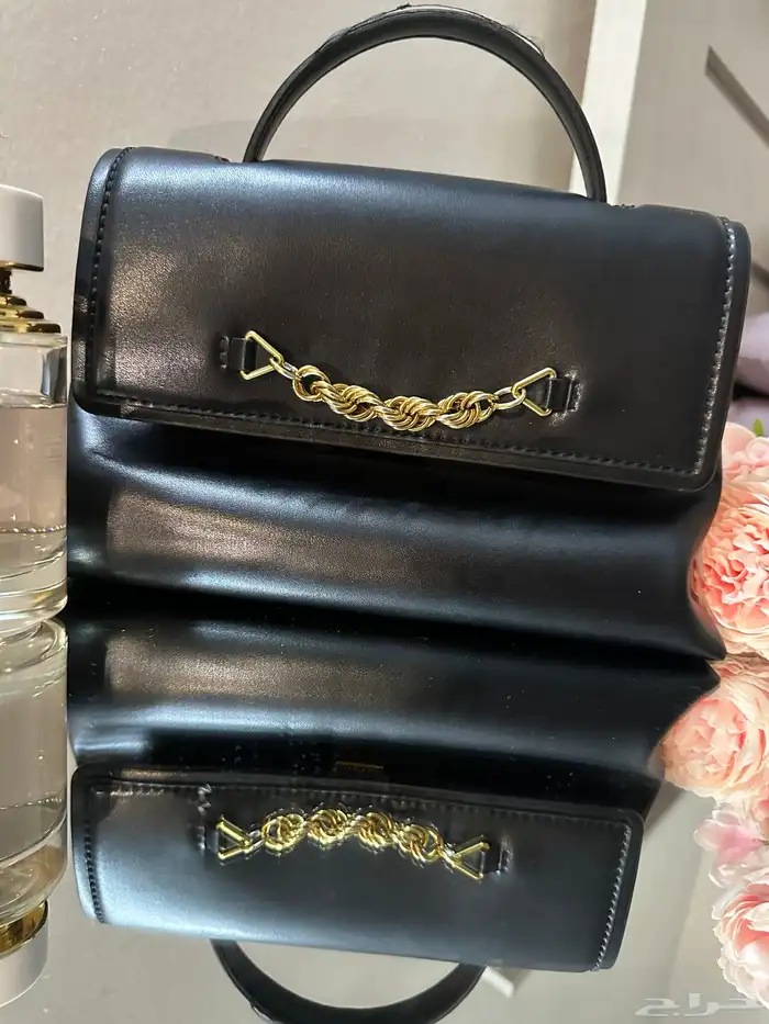شنط ماركة وساعات رجاليه 3