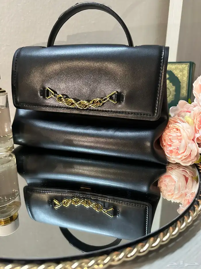 شنط ماركة وساعات رجاليه 4