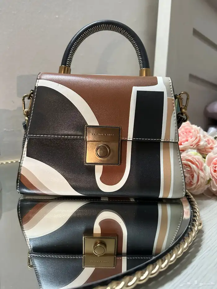 شنط ماركة وساعات رجاليه 1