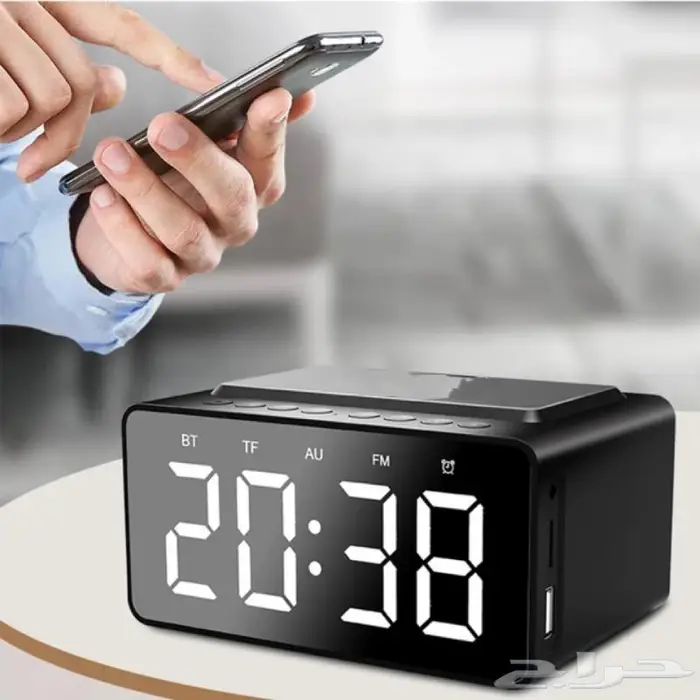 ساعة رقمية مع مكبر صوت وراديو وشاحن جوال لاسلكي 2