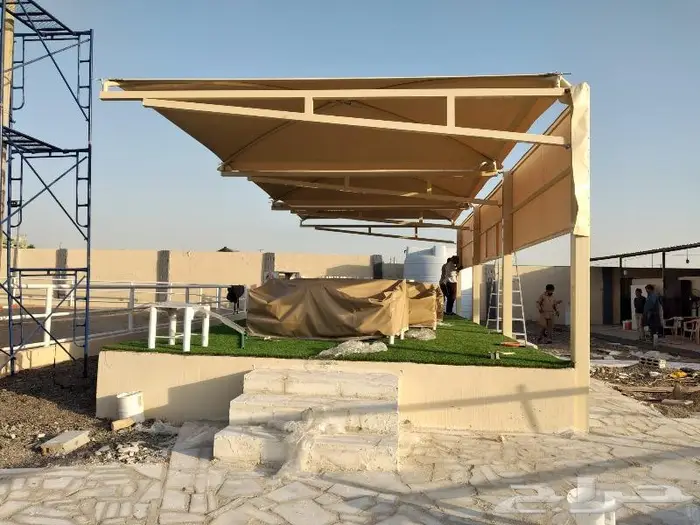 تركيب مظلات سيارات خارجيه للمنازل 11