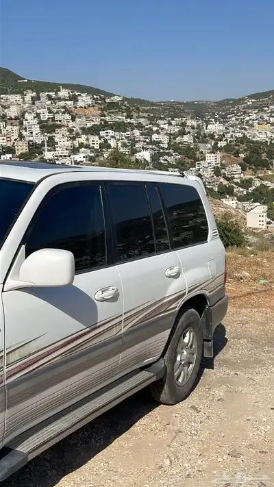 جيب تايوتا لاندكروزر 2003 GXR فل كامل مذهب 1
