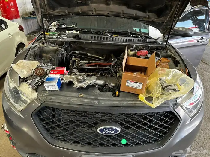 صيانة فورد تورس ادج فلكس اكسبلور تغيير طرمبة ماء 500 ريال 8