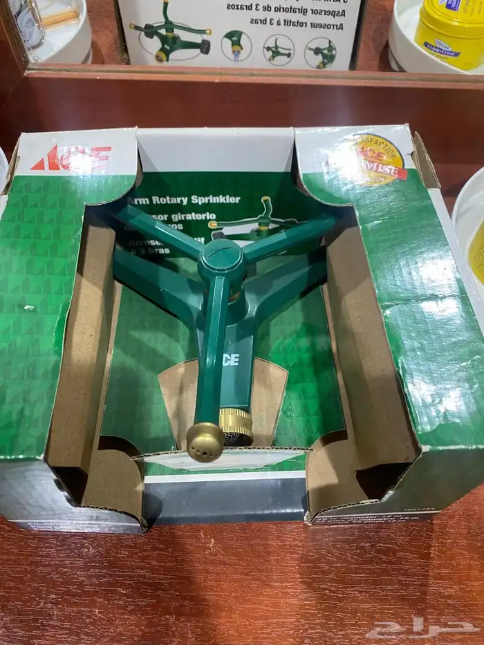 طاولة عصرية وصور ورفوف ورشاش ماء للحديقة وصناديق تخزين 3