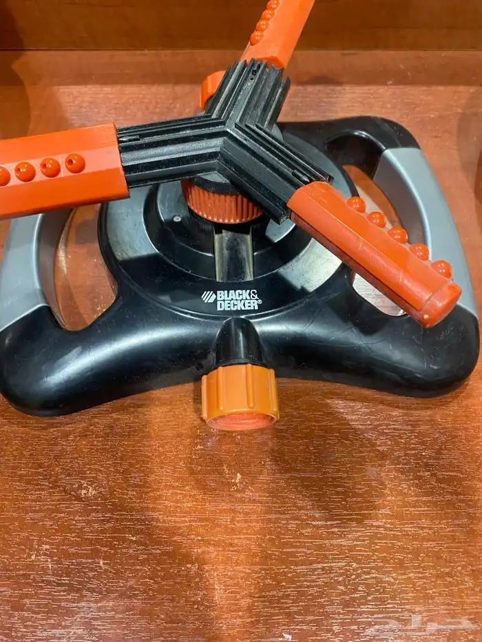 طاولة عصرية وصور ورفوف ورشاش ماء للحديقة وصناديق تخزين 5