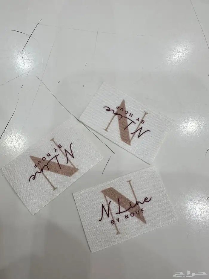 طباعة ليبل قماش للعبايات بكجات عبايات 1