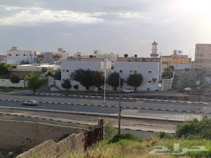 عقار على أرض تجارية على طريق الملك عبد الله (الأربعين) 1