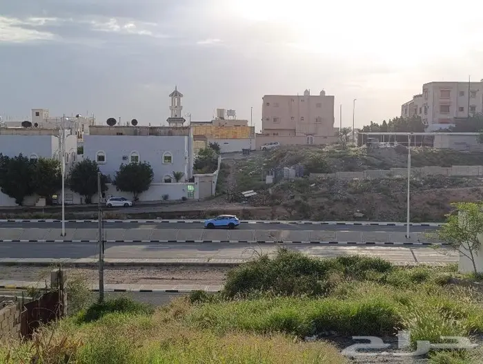 عقار على أرض تجارية على طريق الملك عبد الله (الأربعين) 3