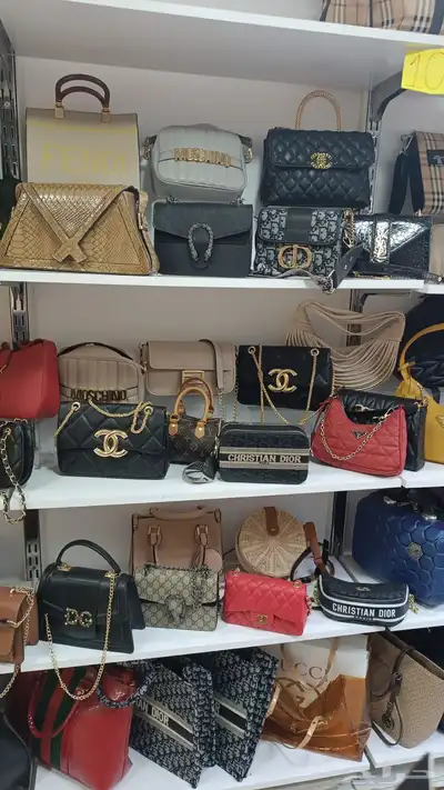 ملابس حديثي الولادة وشنط واطقم نسائية 32