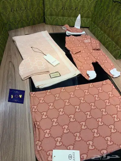 ملابس حديثي الولادة وشنط واطقم نسائية 7