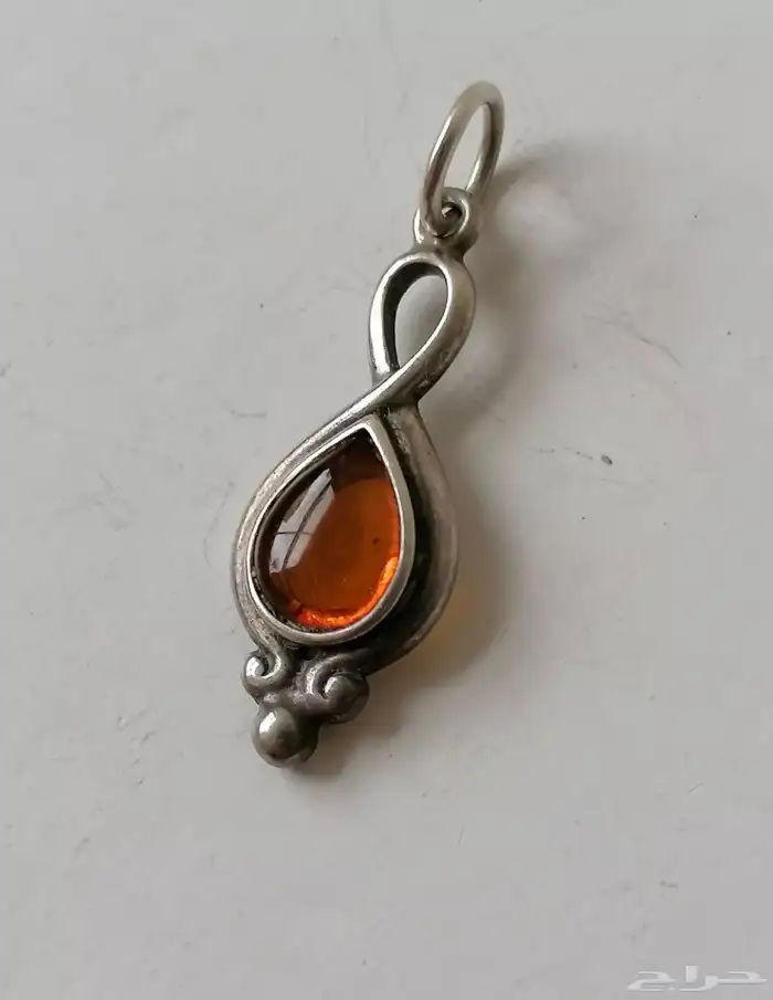 تعليقة  فضة بعنبر الكهرمان الأصلي 10