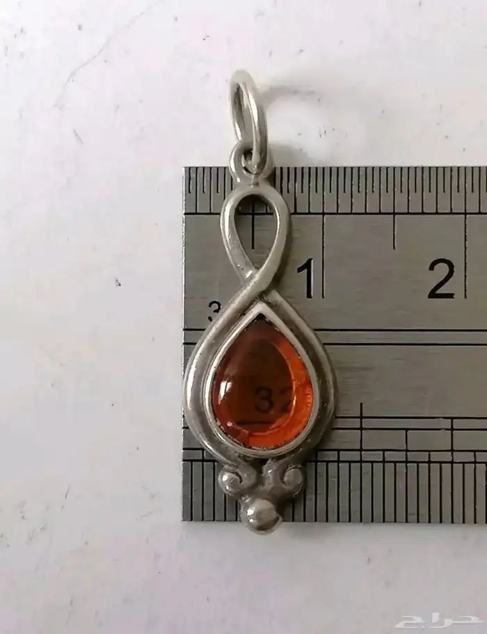 تعليقة  فضة بعنبر الكهرمان الأصلي 11