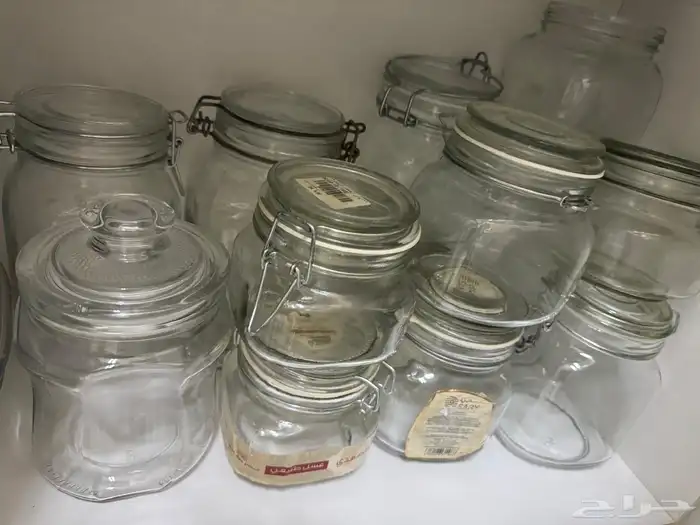 علب زجاج للعسل وبلاستيك وستيل 0