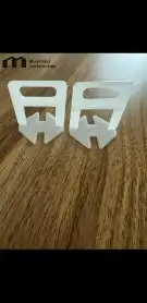 فواصل كلبسات تركيب بلاط بورسلانtile leveling spacer widges 1
