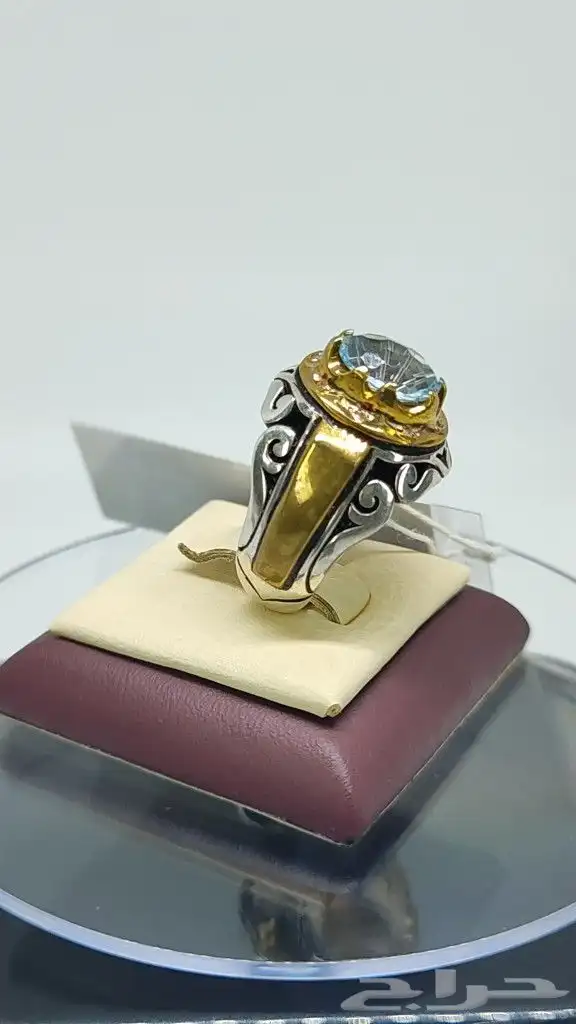 خاتم توباز مرصع ب 8 قطع ألماس 0