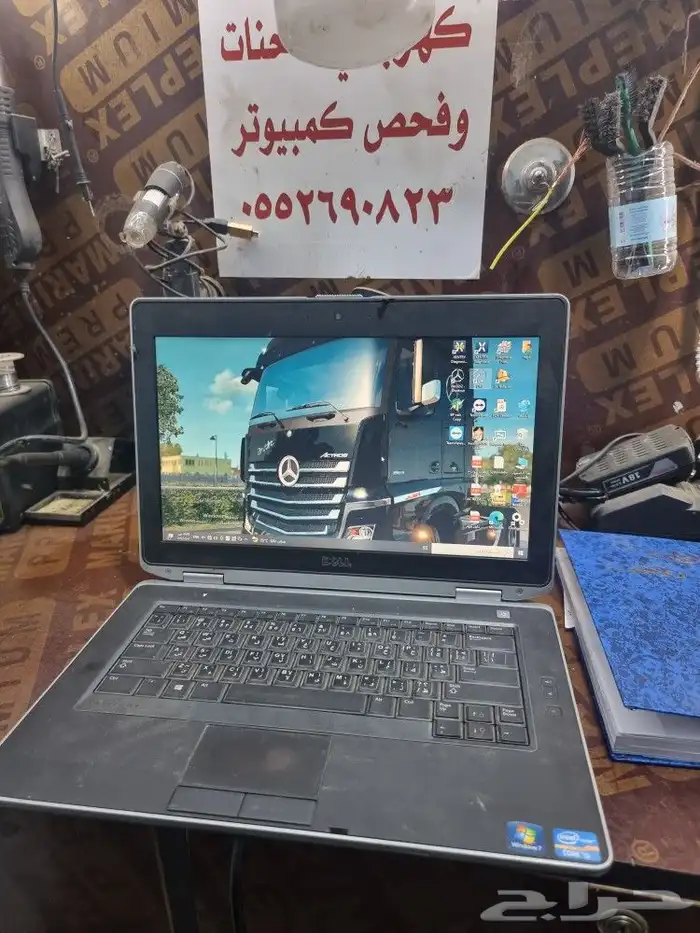 كهربائي شاحنات وفحص كمبيوتر 3