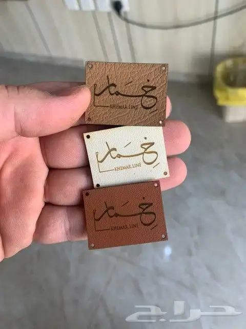 لوقو جلد ليبل قماش اكرليك 2