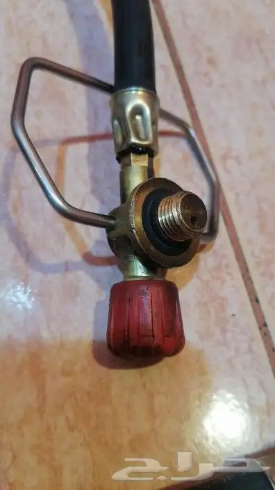 لي تعبئه دبه الغاز الزرقاء من الحجم الكبير للحجم الصغير 1