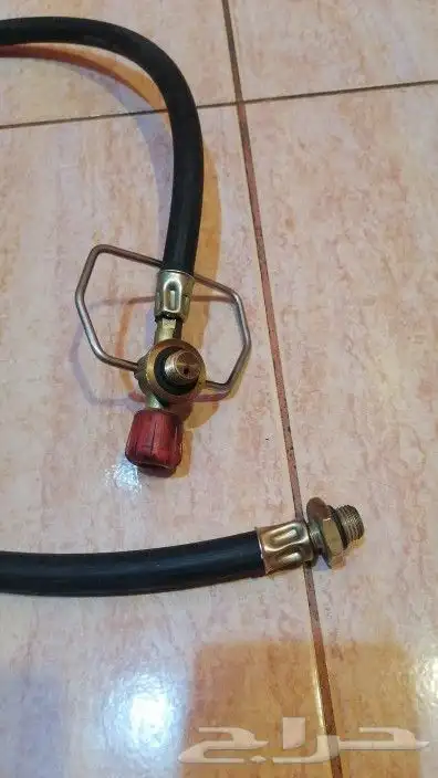 لي تعبئه دبه الغاز الزرقاء من الحجم الكبير للحجم الصغير 2