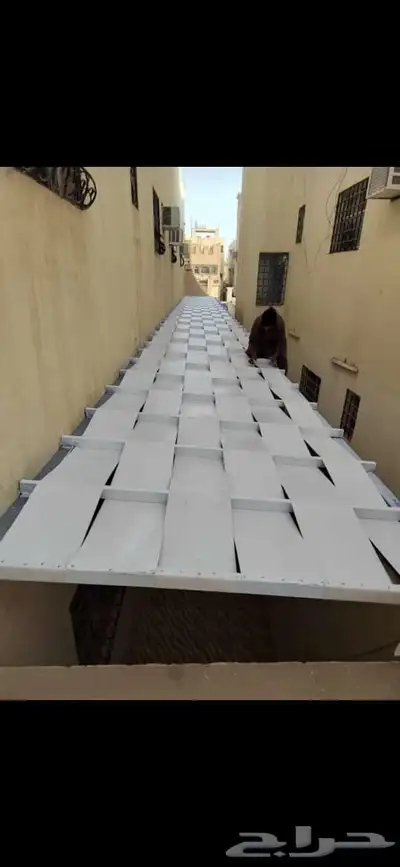حدادمظلات وسواتر وبرجولات 19