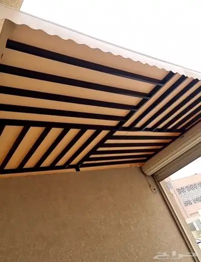 حدادمظلات وسواتر وبرجولات 32