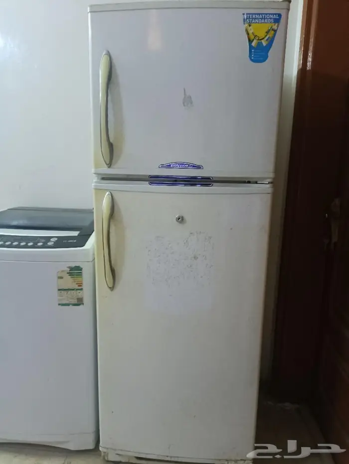غسلة ملابس وثلاجة وتلفزيون 4