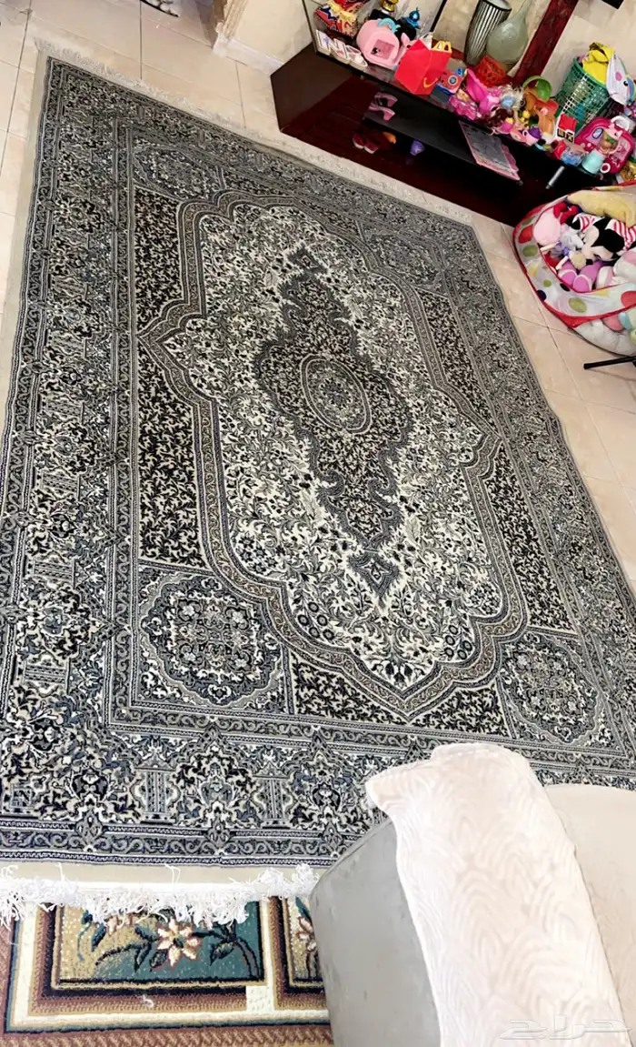 سجادة ايراني فاخرة ب 1500 ريال نظيفة ومغسولة بغلافها 1