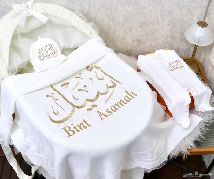 أطقم مواليد تطريز بالاسم 2