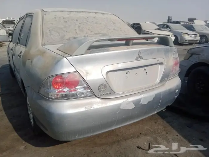 جنوط لانسر الاصليه طقم 4 مقاس 14 2