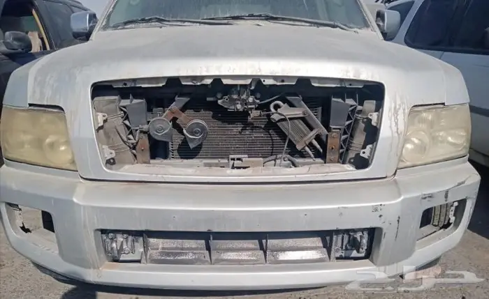 قطع غيار الانوار الاماميه الكمبروسر رمادا نيسان 1