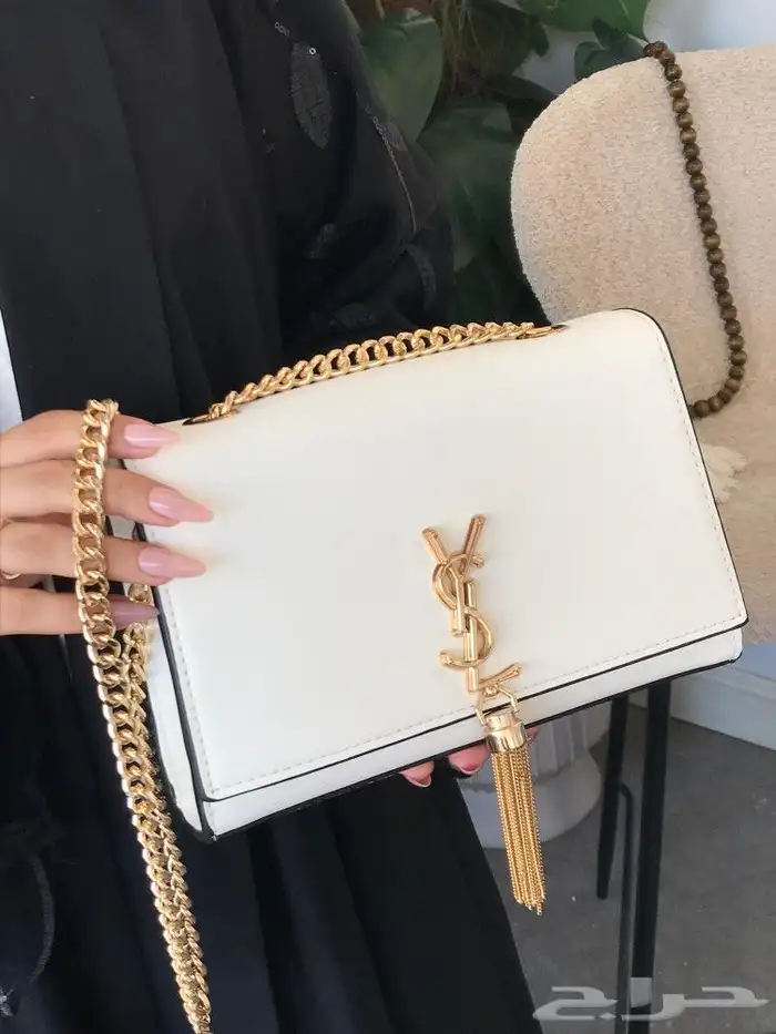 شوزات وشنط ماركة سان لوران 11