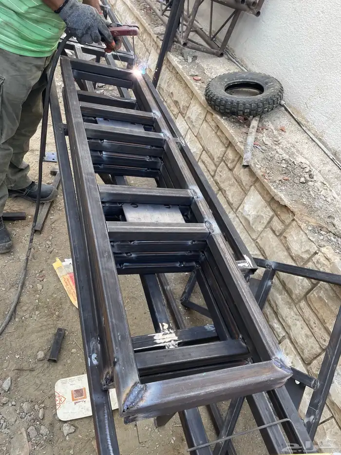 أعمال الحدادة الكريتال هناجر ومظلات وسواتر وتأسيس مصاعد 53