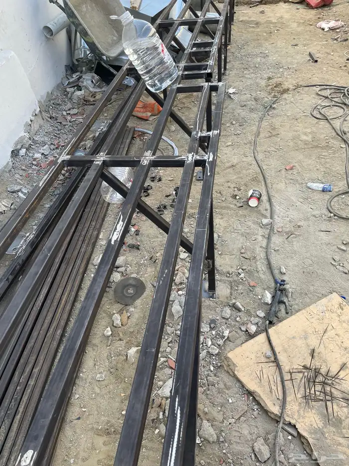 أعمال الحدادة الكريتال هناجر ومظلات وسواتر وتأسيس مصاعد 49