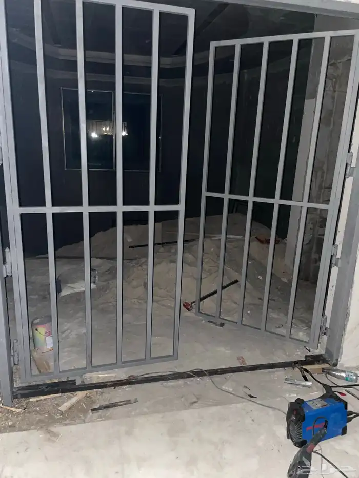 أعمال الحدادة الكريتال هناجر ومظلات وسواتر وتأسيس مصاعد 18