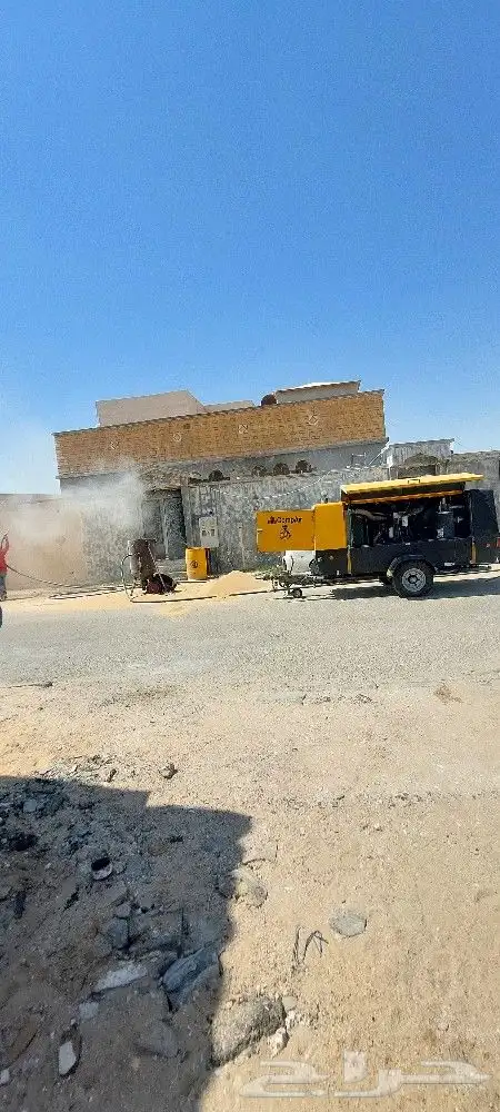 ازاله الصبغ القديم بالرمل وتخشين خرسانه 1